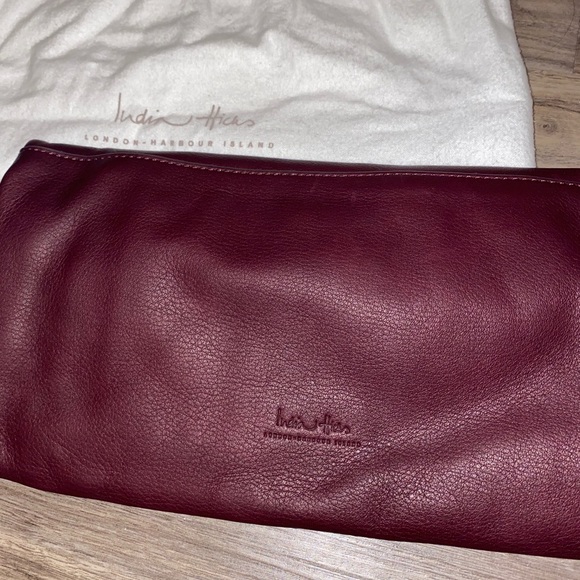 India Hicks Leather Tassel Clutch